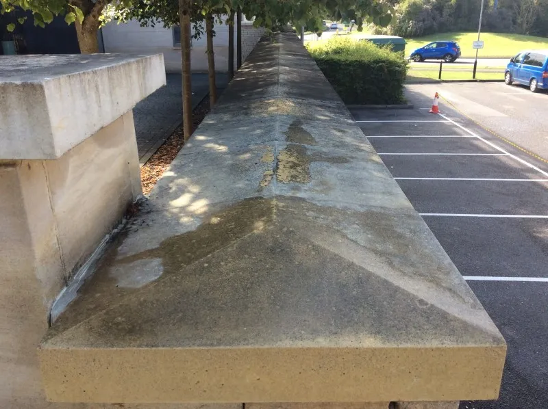 Capping stone wall before